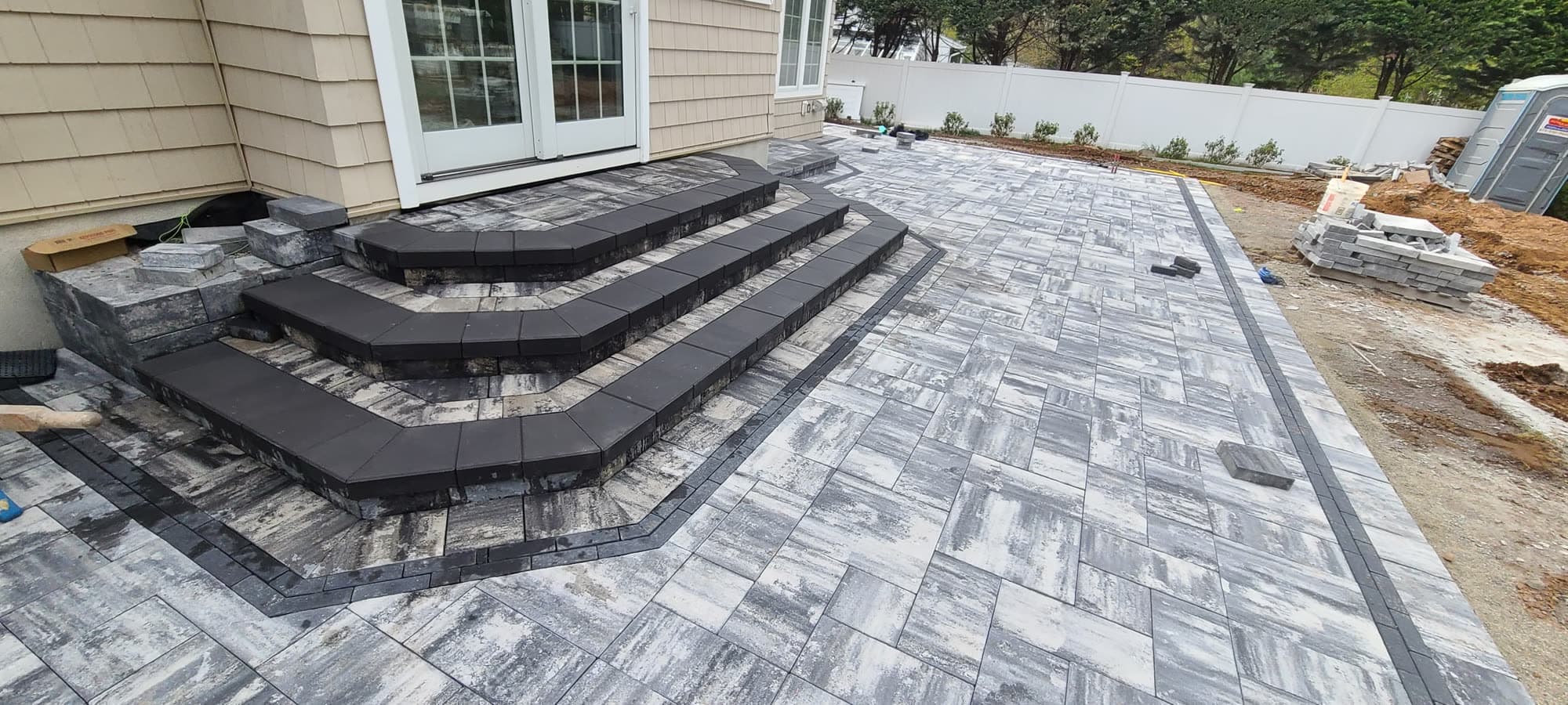 Paver patio with wrapped corner steps